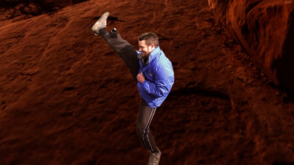 The leg swings up above the top of the target at full height. Make sure the leg is straight.