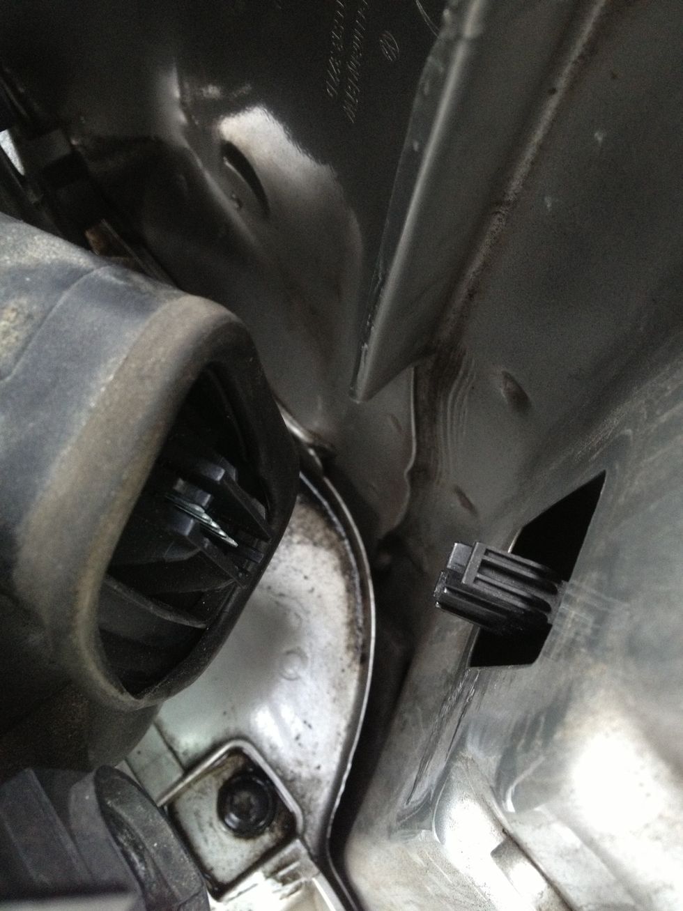 The light enclosure is still attached to a connector: unplug it.