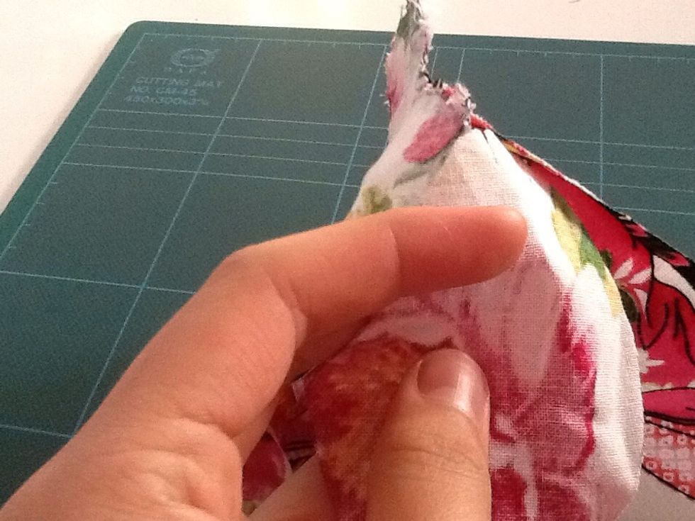 The little notch we cut earlier- as you can see, aligns up with the top of the shoulder. Sorry if you can't see it too well- it's hard to take a picture while holding this up.