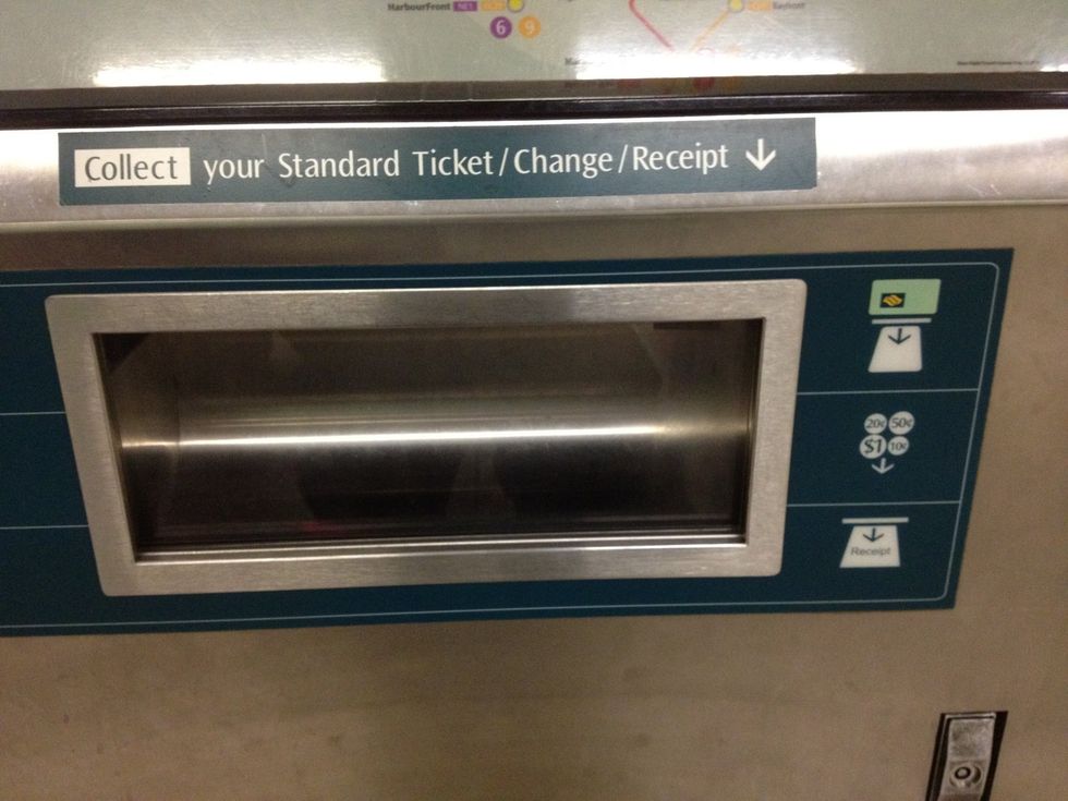 The machine will issue the standard ticket, receipt and any change at the wide slot at the bottom of the machine. Collect your ticket, receipt and change. You can now use your ticket for travelling