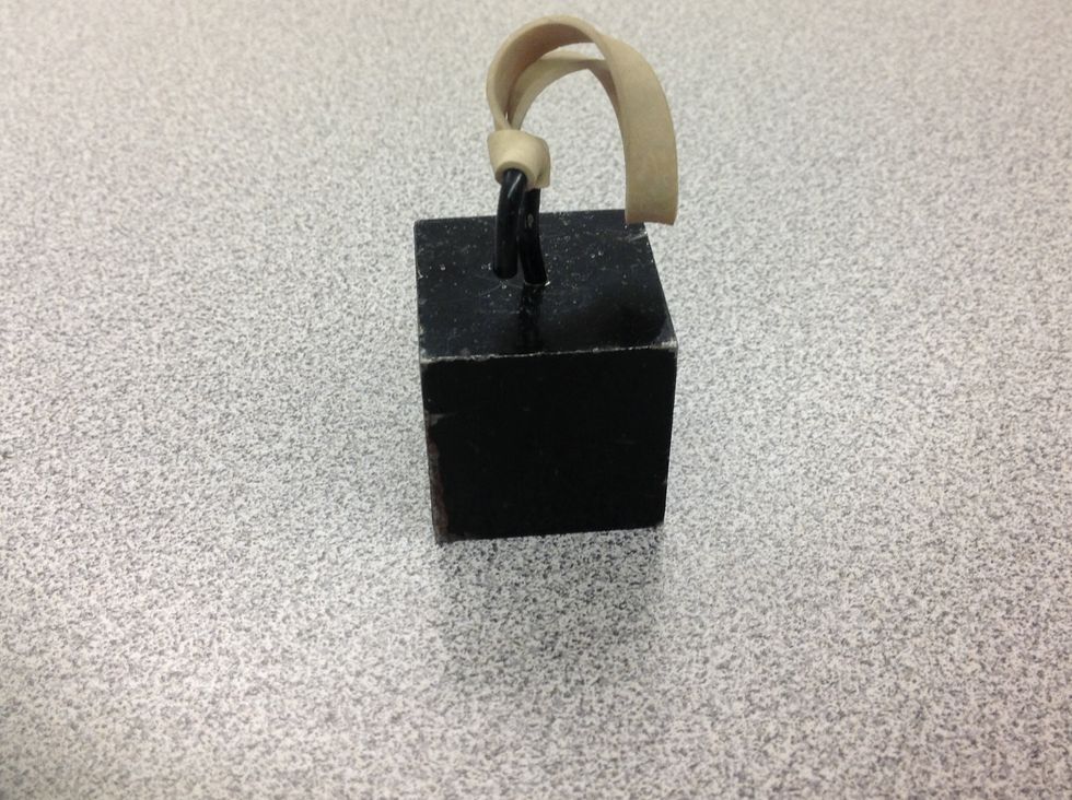 The mass lifted by the lever is the load.