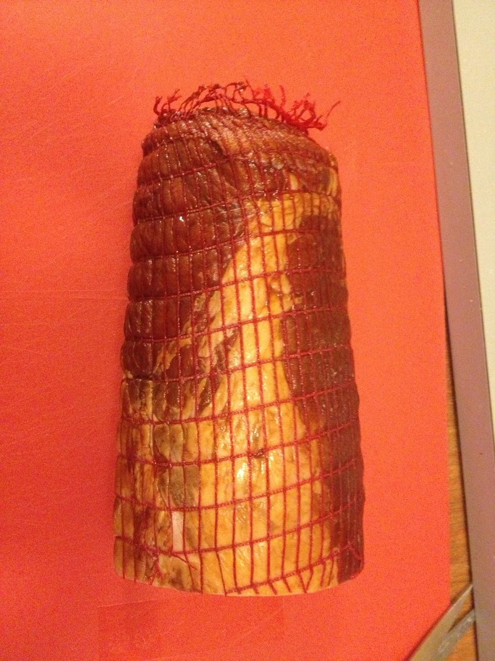 The meat is smoked pork loin and it has quite a distinct flavor. You can eat it raw, sometimes children prefer it that way, but it tastes better when cooked. It comes vacuum-packed.