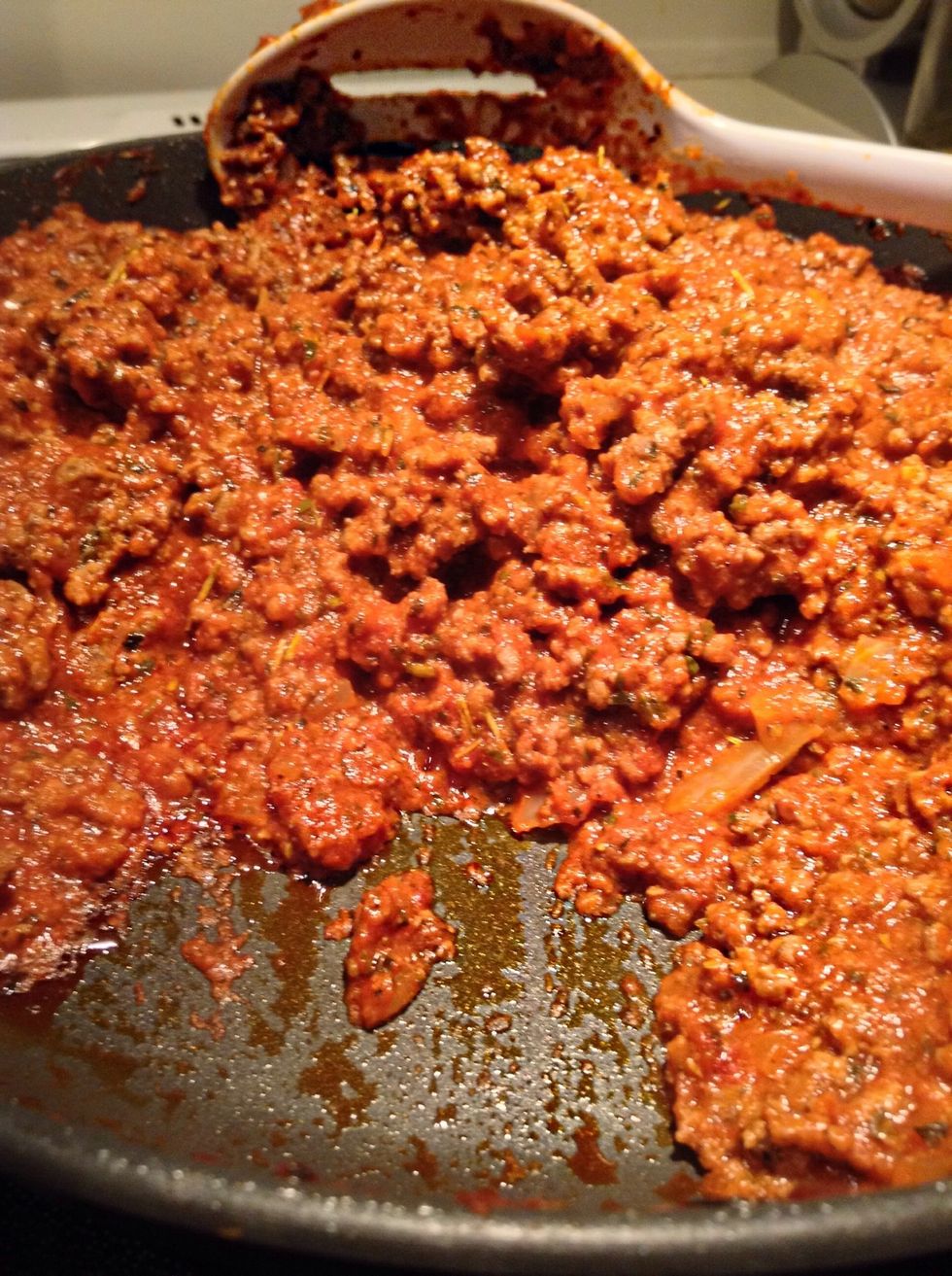 The meat mixture should be done by this time. The meat should be thicker. How I test it is I scrap my spoon into the mixture if I see that I can make a clear path then it's ready.