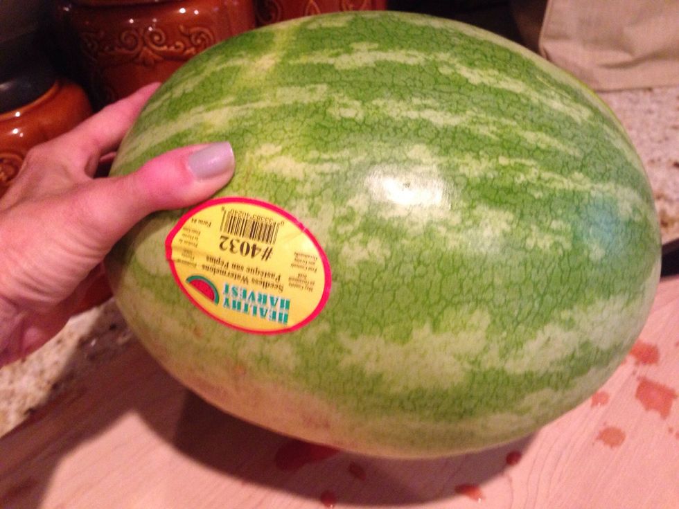 The melon should be heavy. This means lots of water inside. Since all are heavy, pick the heaviest one.