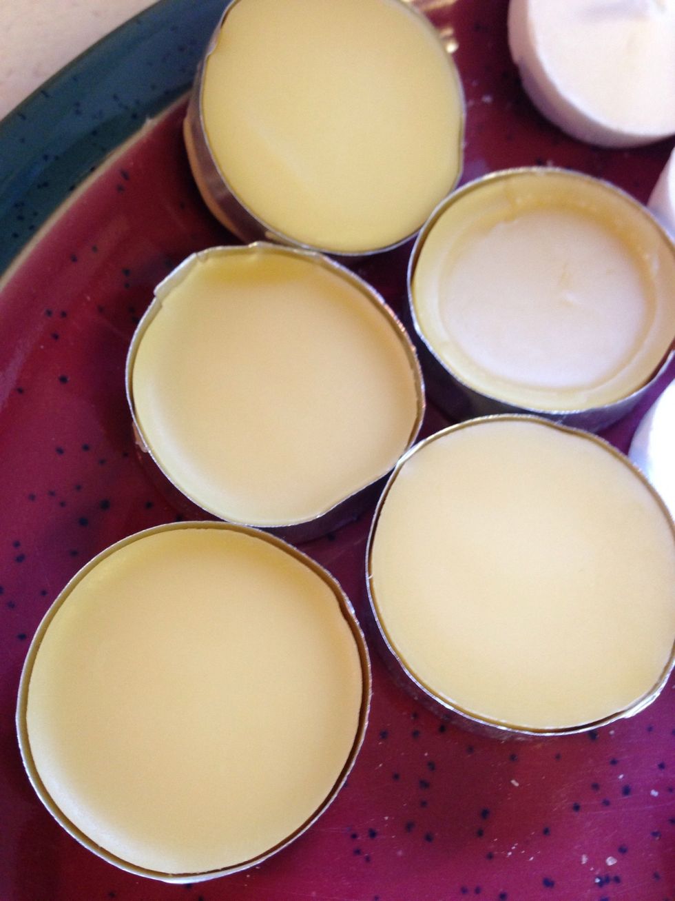 The melts are dry when they don't give when pressed in the center. As they dry, they will pull away from the edges of the molds.