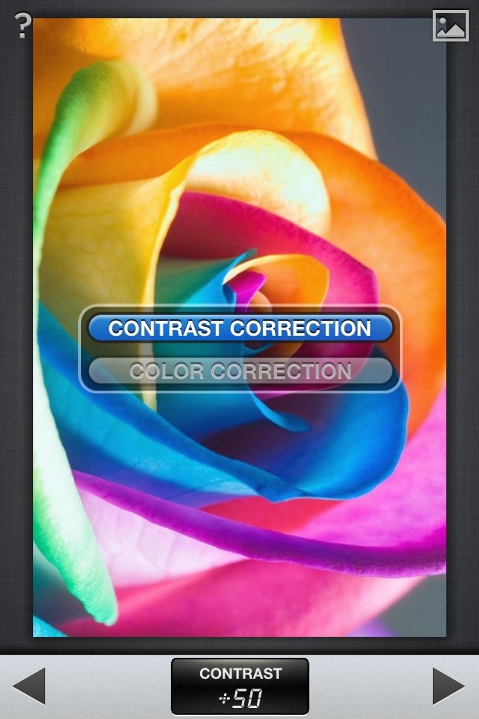 The menu for Automatic. You swipe down to reveal the menu. Press the right arrow to save the adjustments. Press the landscape photo button to see the original. The question mark is the overlay