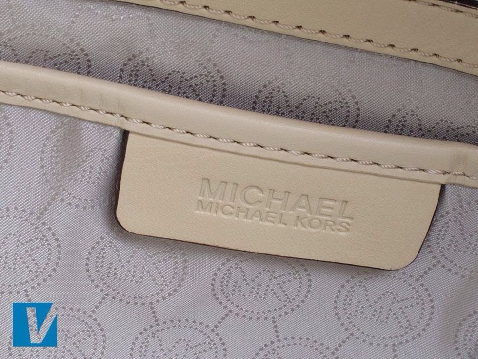 The Michael Kors logo, in full or MK on the lining, may appear on the interior of the handbag. Check the font, spacing and positioning of the logo carefully, as well as the material quality.