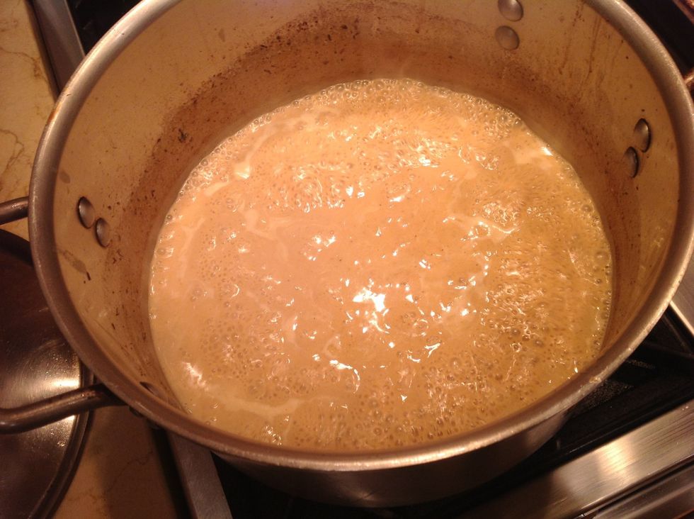 The milk will break. Reduce to sauce consistency