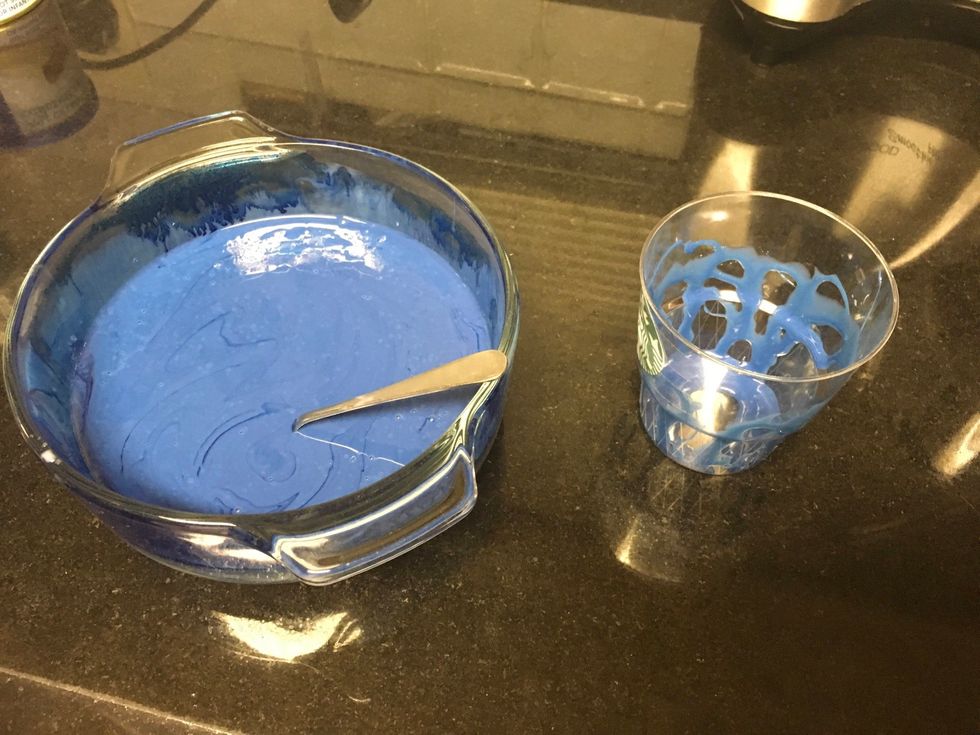 The mixture should look like this. Take a spoon and drizzle the blue syrup into the cup