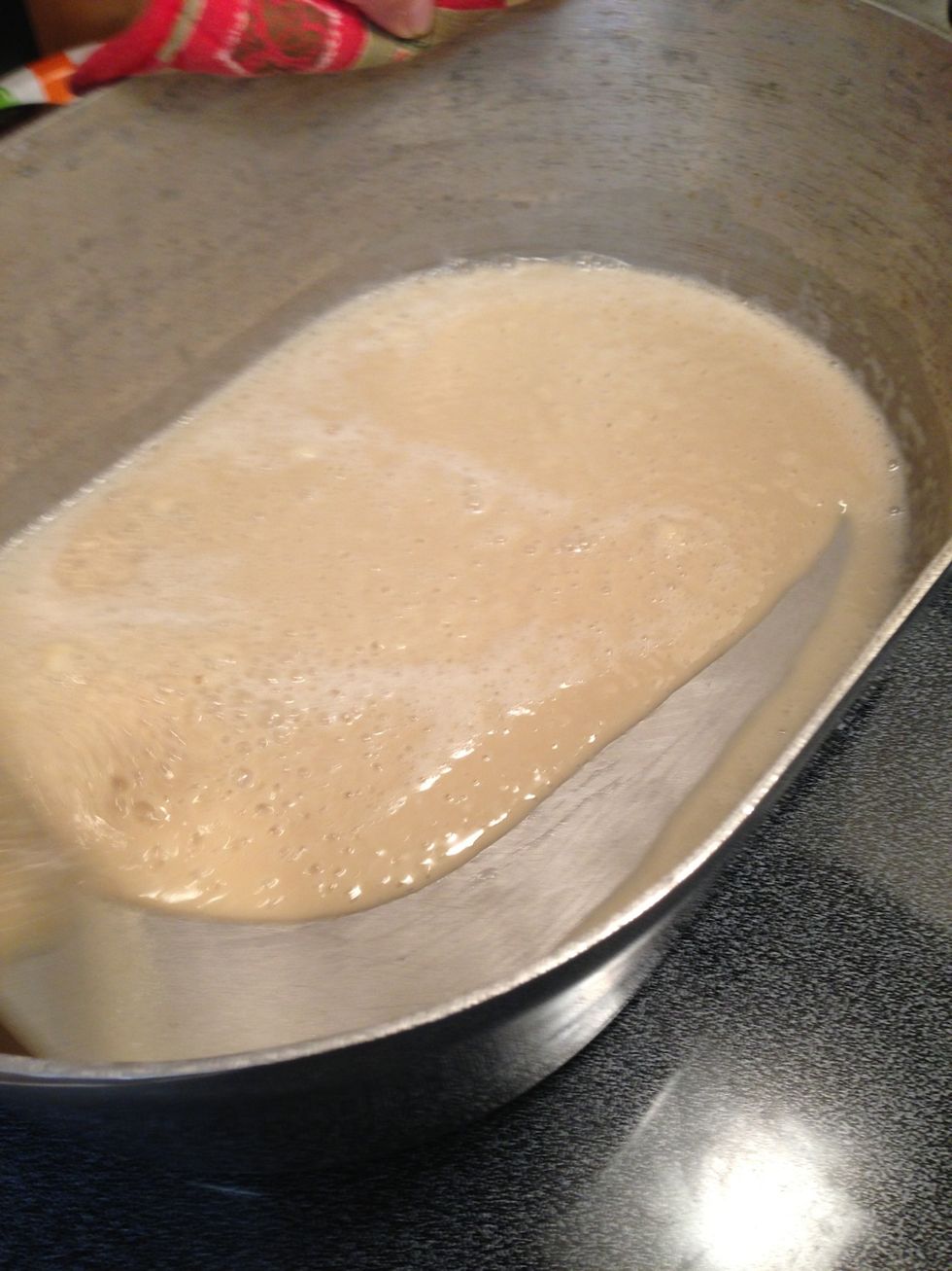 The mixture should start to become a smooth slurry so that when you scrape the pot with the spoon, it stays off the bottom.