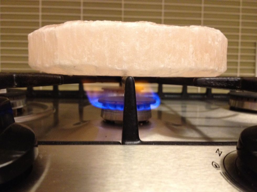 The most important thing to know about cooking on salt is that you need to heat the salt up sloooooooowly. After you have heated the block over low heat for 10 minutes, turn the heat up to medium low.