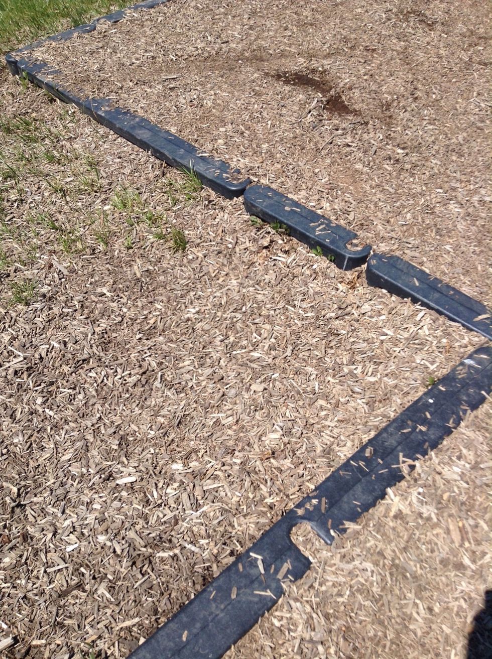 The mulch in this was moved and dropped off by people and other causes. (Deposition)