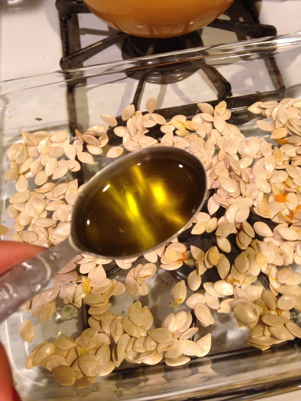 The next day, mix in the oil and spices.