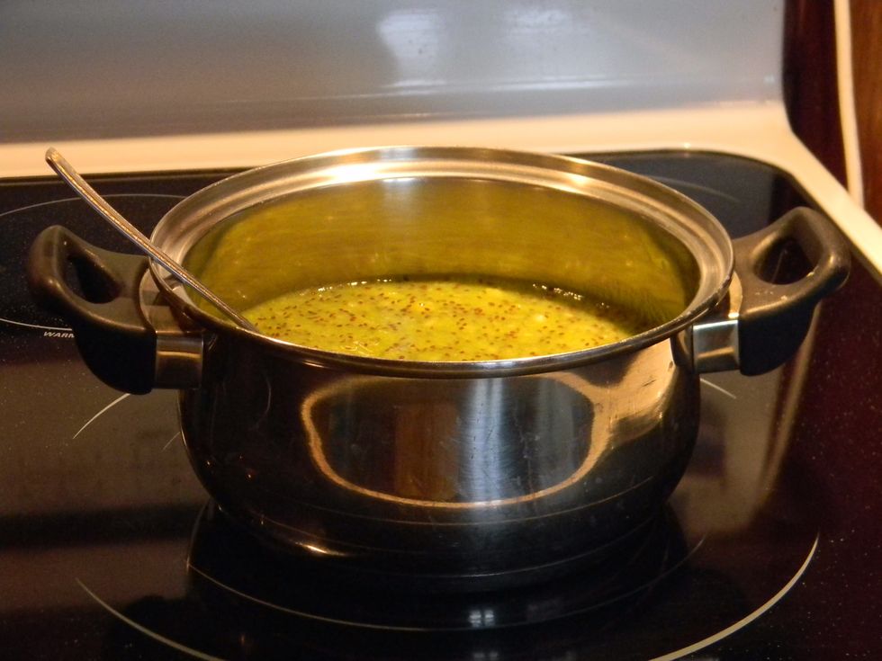 The next day, or whenever you want to continue, you transfer all the puree to a pot and heat it up on medium, until it steams. Stir frequently to prevent burning.