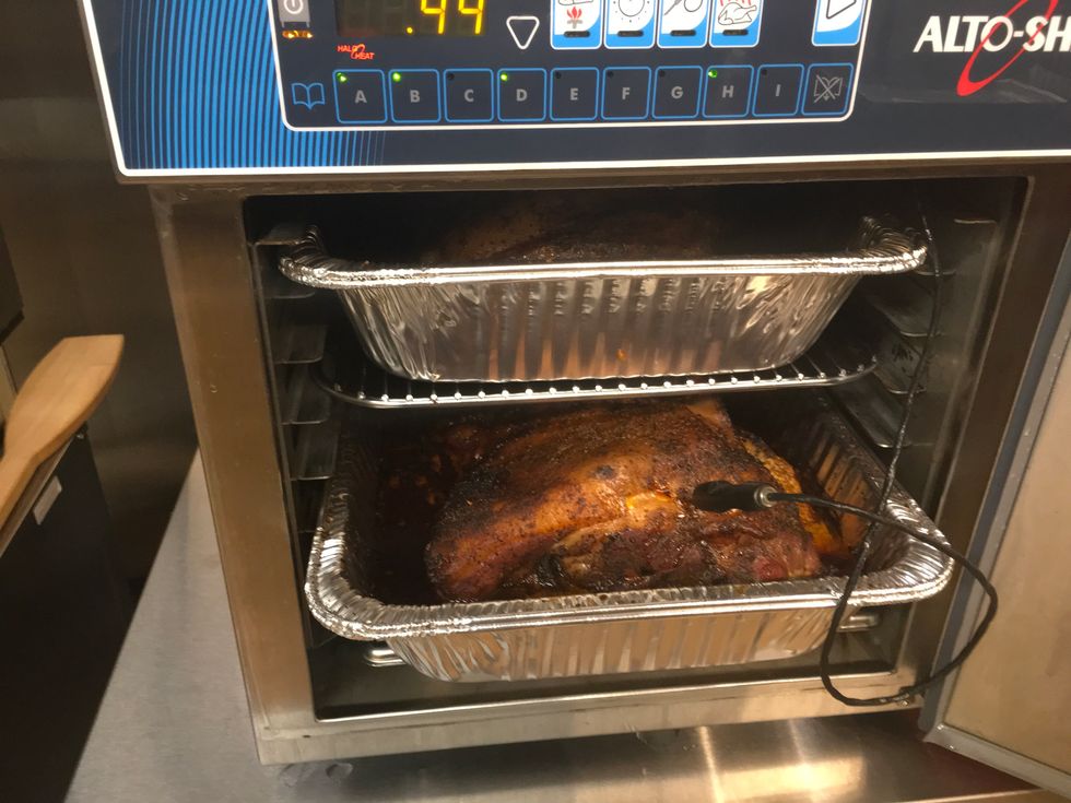 The next day pull the pork from the Alto-Shaam Cook & Hold oven.