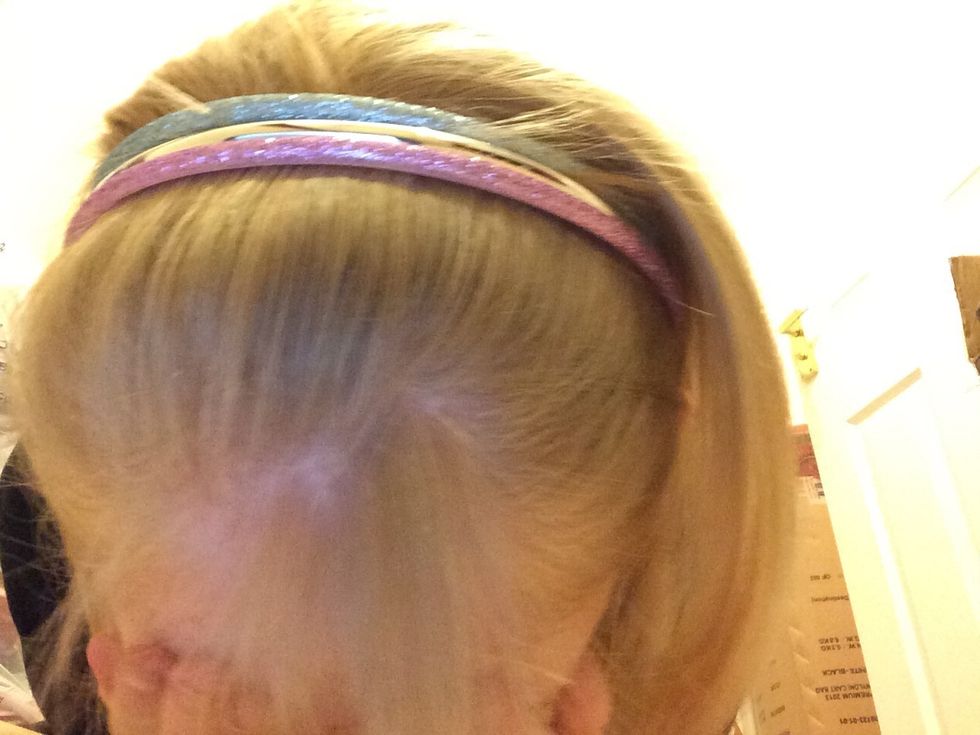 The next hairstyle is easy and cute. Find a headband that you like, and put it on your head.