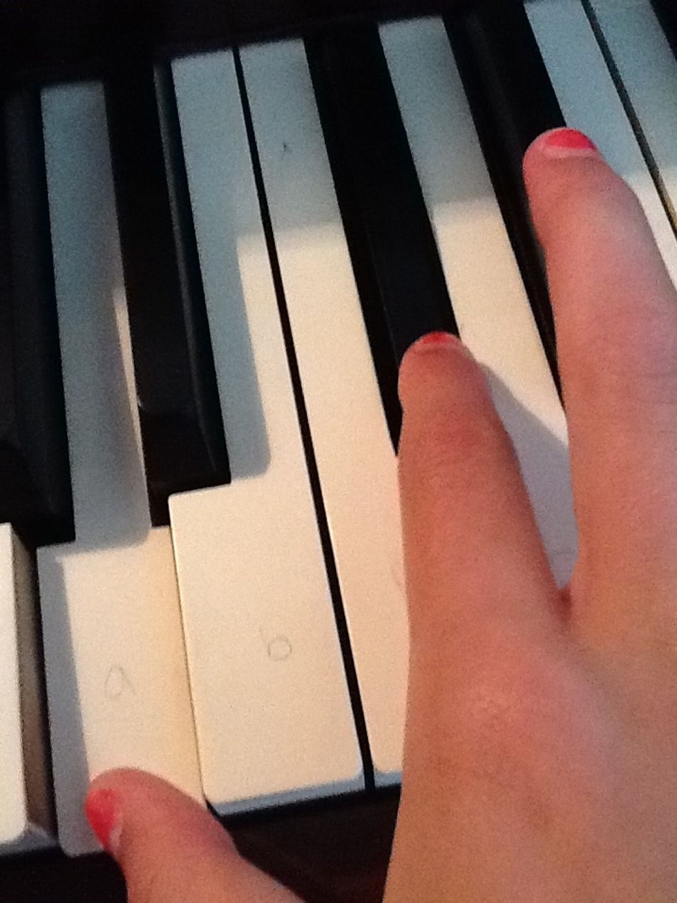 The next key is the black key right above middle c