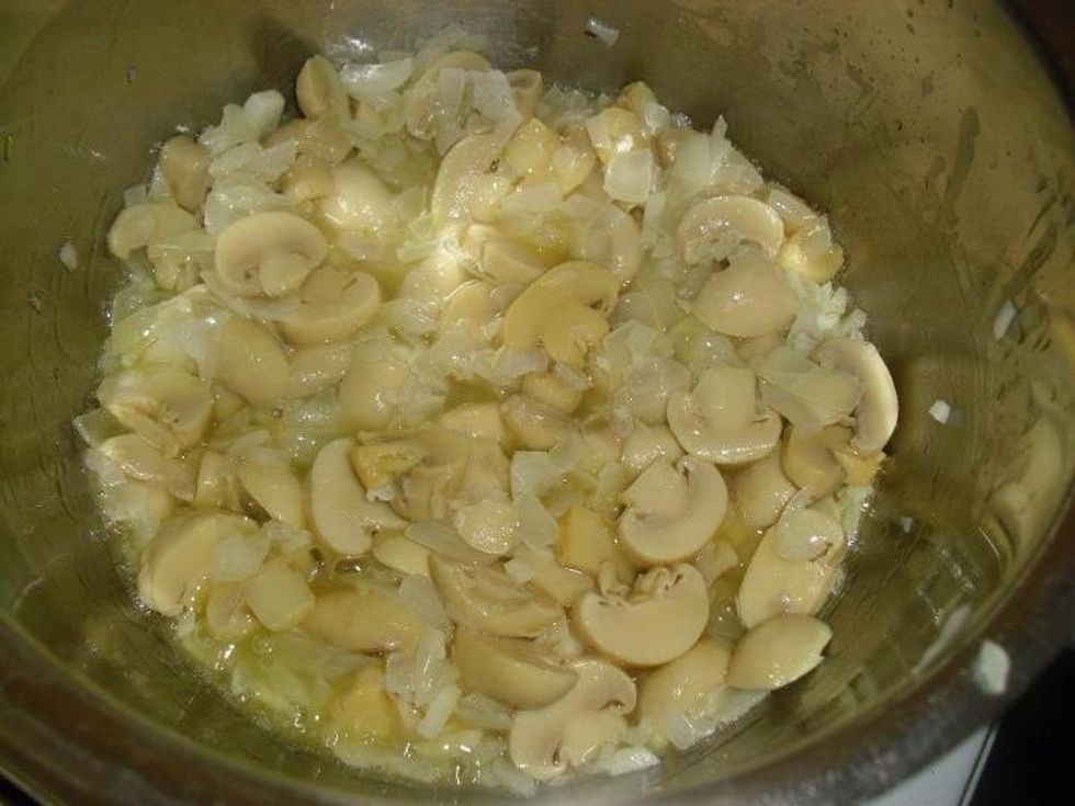 The next step is to add the mushrooms, and cook over a high heat for 3 minutes whilst stirring constantly.