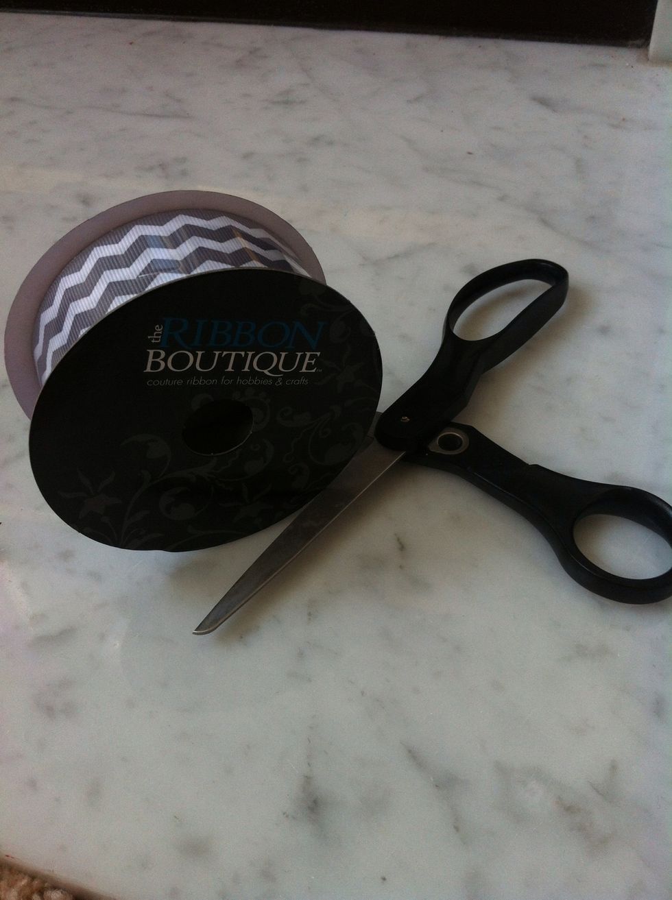 The next step is to take your decorative ribbon (I got mine from Hobby Lobby) and measure it to fit around your silver bucket ( which I also purchased from Hobby Lobby).