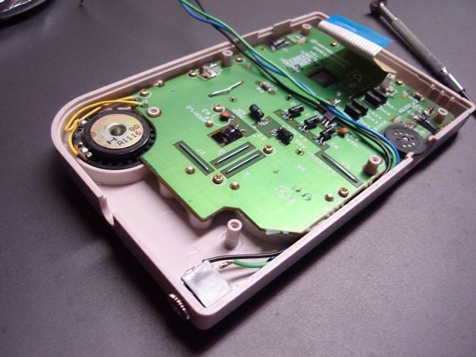 The next step is very important. Getting the wires ready to solder onto the board. Make sure that the wires are not touching the contrast dial.