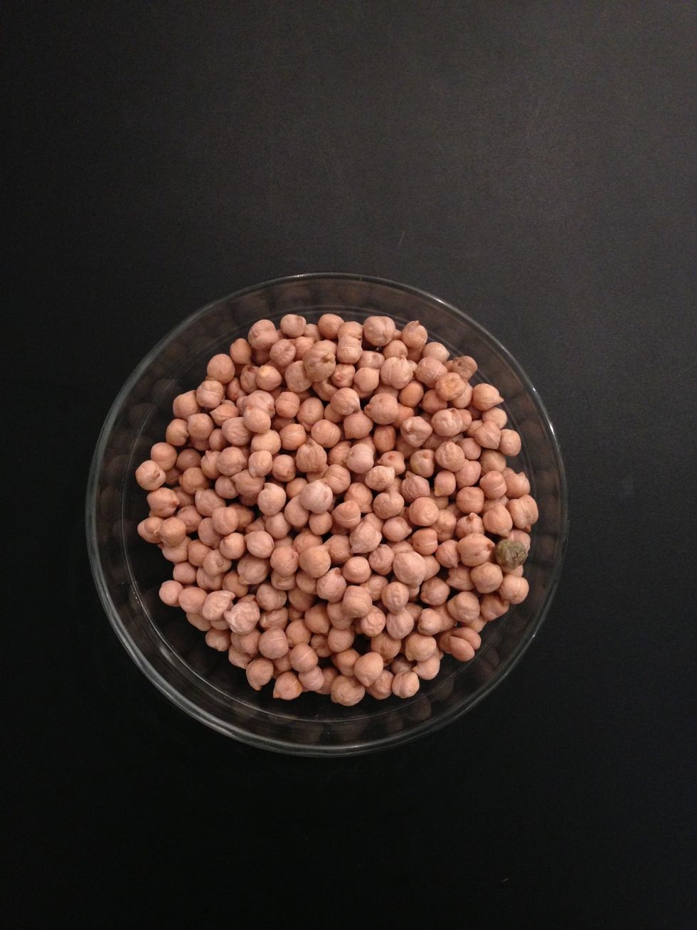 The night before. Soak 300 g dried garbanzo beans. They will yield 600 g boiled. You can always get already boiled garbanzo beans