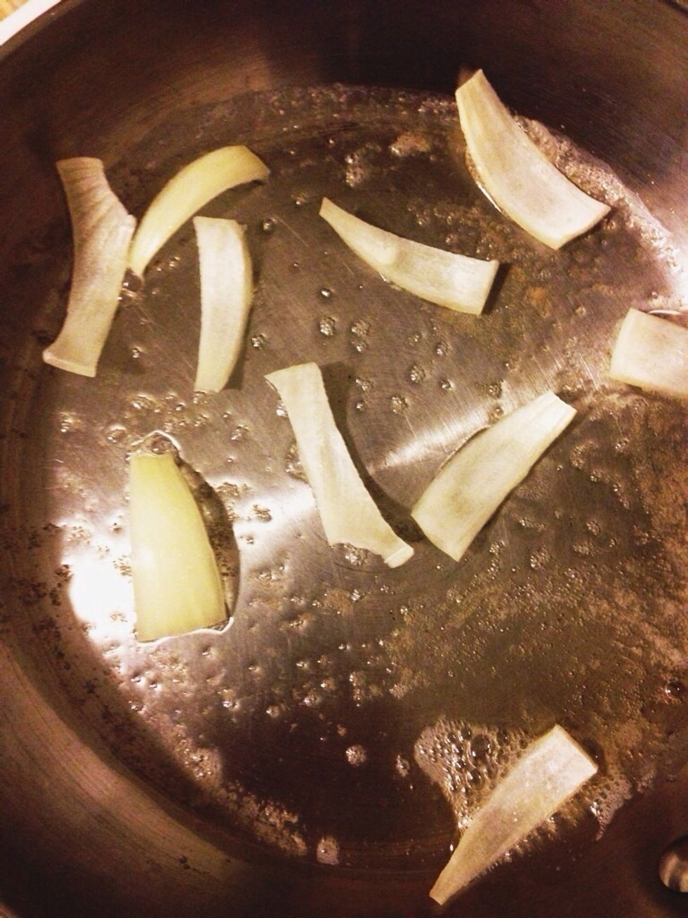 The onions will take the longest to cook. Begin caramelizing them first.