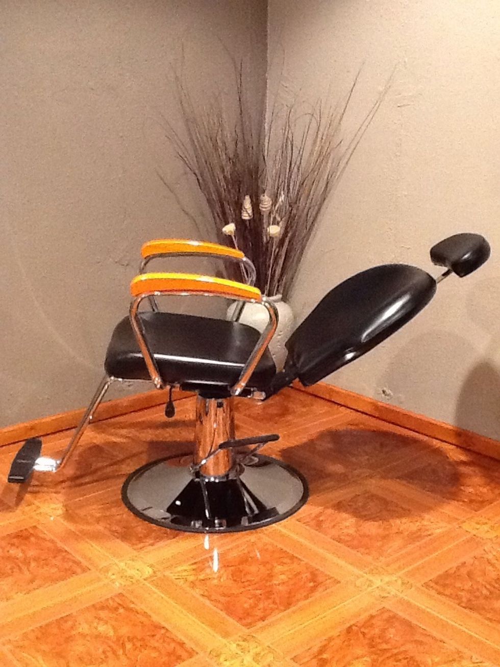 The only NEW piece of furniture I've ever owned! $155 from LCL (find them on eBay). I do lashes, brows & facials in this chair. My space is too small for a facial bed. Check out the vase! I sprayed it