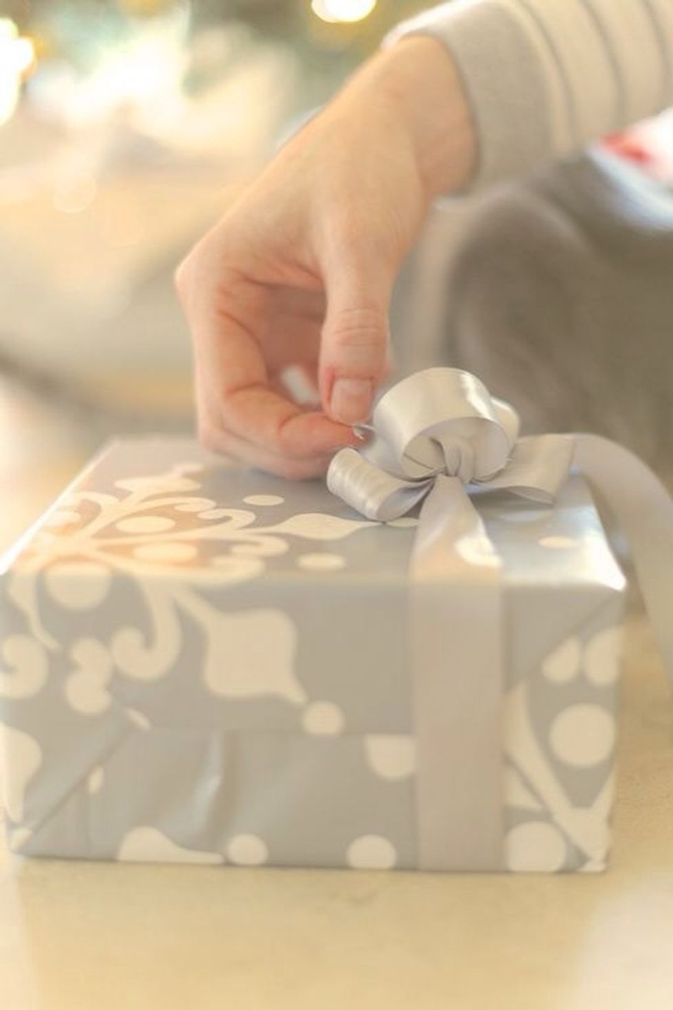 The opposing side trick is how you get loops! Continue doing this with one ribbon, then the other until there is no extra left. This should be about twice per ribbon.