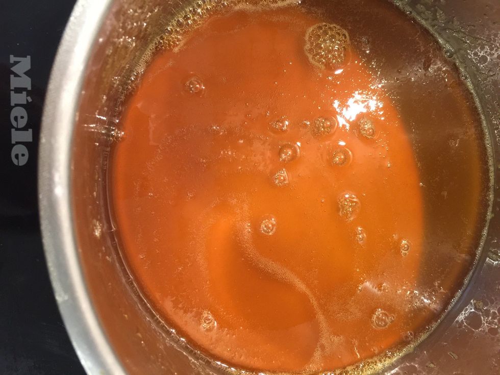 the orange juice-sugar is 1/2 (1 cup) and the sugar turned into caramel.