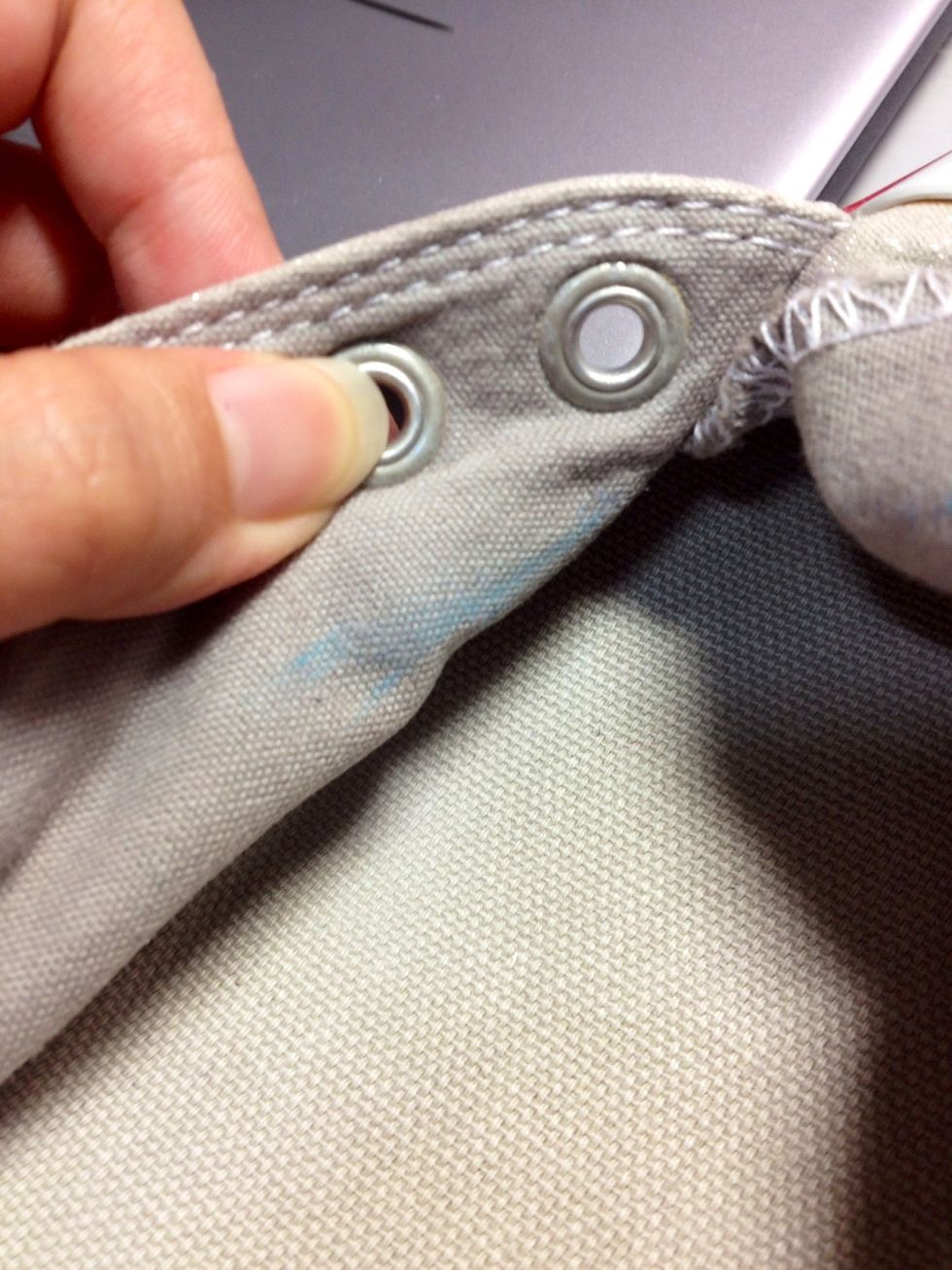 The other side will be a bit harder because you need to pull the flap over, so it may help to mark with a chalk where you intend to sew the flap. Repeat for this side.