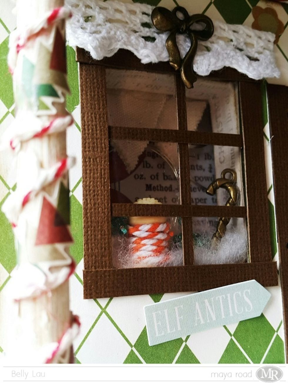 The other window I had here a Maya Road wooden spool, Ken Oliver candy charm and burlap banner.