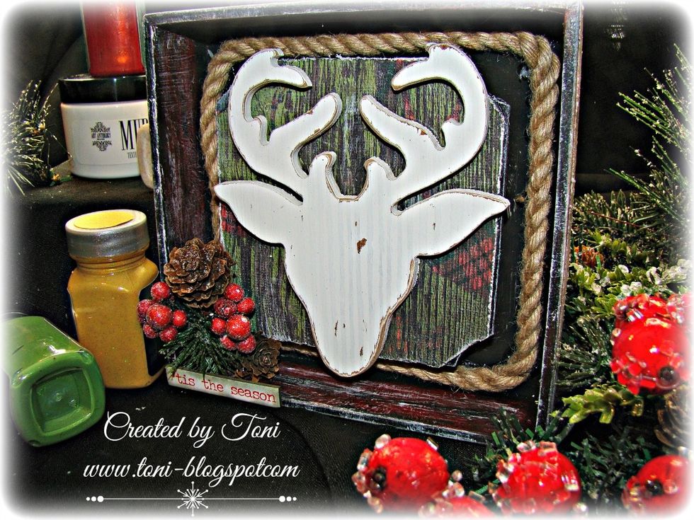 The outside of the box on this was painted with black gesso, then dry brushed with Sorbet Ferrarie, Parakeet and Vegas Gold. Add your rope and festive berries.