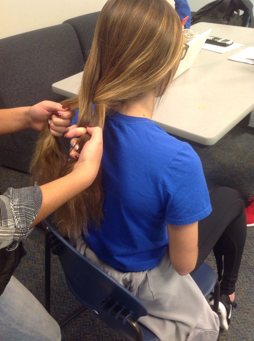 The outside piece should have became the middle piece. The hand that started with one. If needed readjust your hands without dropping the pieces.