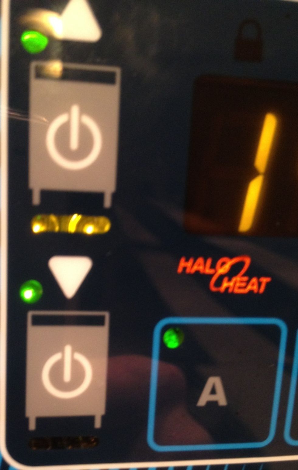 The oven has 2 on/off buttons. Top button upper smoker. Bottom button lower smoker.