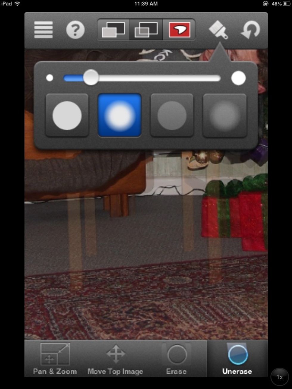 The paint brush button allows to resize the tool so that you may have a finer control of the areas you are erasing. You can zoom into your image to get into the hard to reach areas.