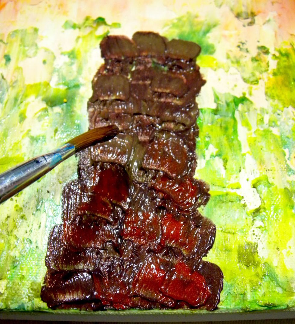 The palmetto tree has a different trunk than a palm tree. Its bark grows in a criss-cross pattern. Start out using a small, flat brush, alternating liberal amounts of Truffle, Terracotta and Kona.