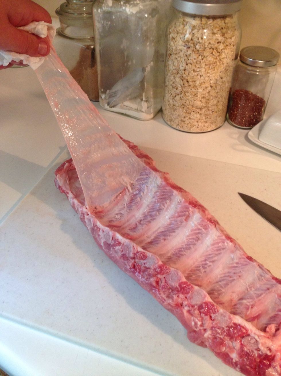 The paper towel helps it not slip out of your fingers, and as you can see, it will pull all the way off if you did it right. If it breaks, just start pulling again.