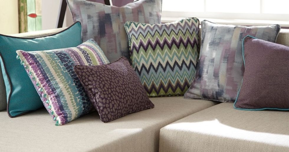 The perfect way of re-imagining living spaces in your home is to add cushions of different textures and fabrics in the right places.