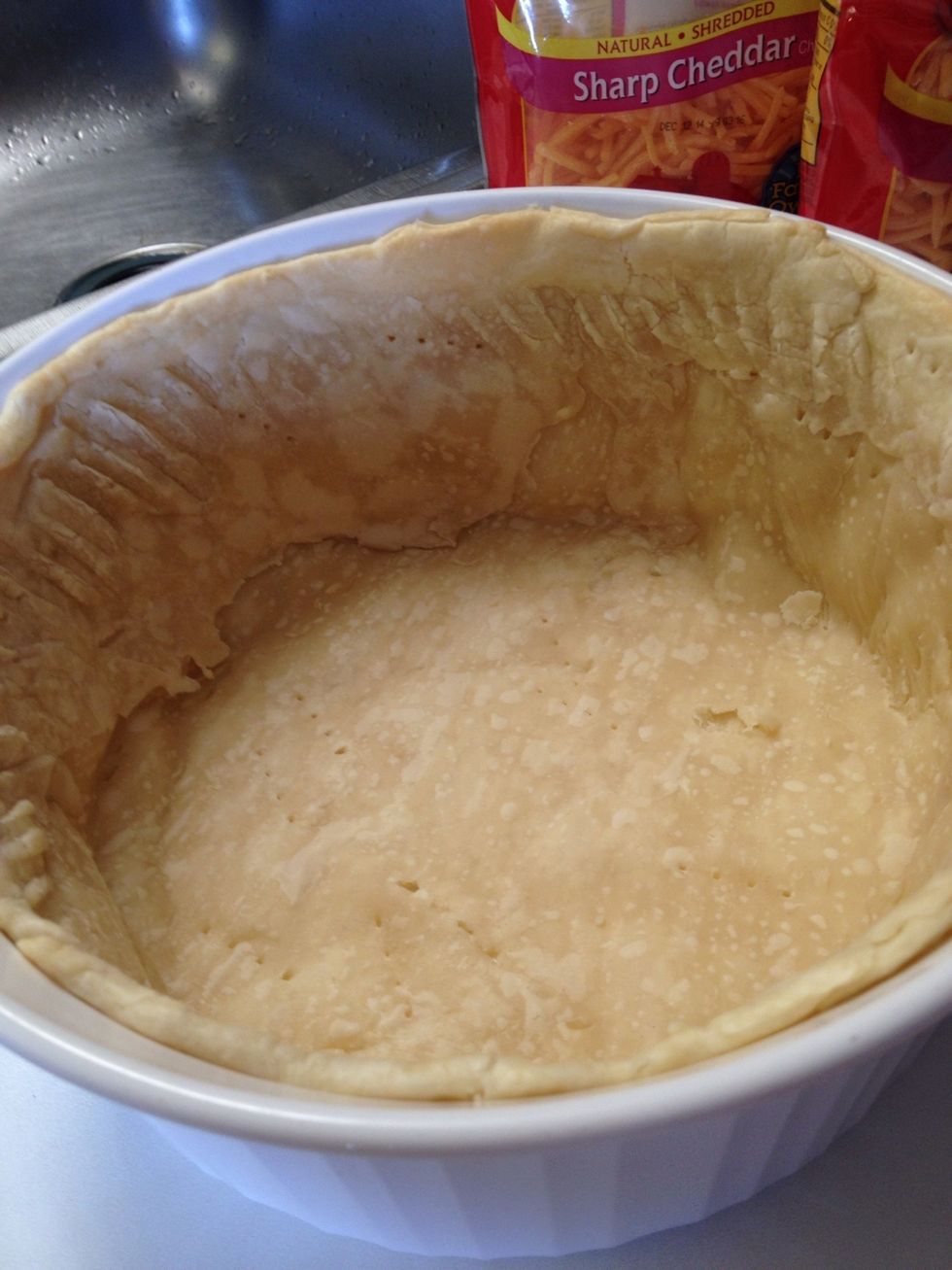 The pie crust should look like this after baking a bit. Just enough to get the crust started, so it's cooked all the way through in the oven.
