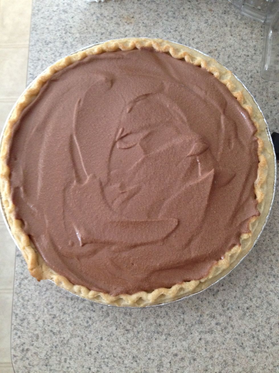 The pie should look like this. Chill it in the fridge overnight or for 2 hours. If you have too much chocolate filling- spoon it into ramekins for pudding. You never know when you'll want pudding.