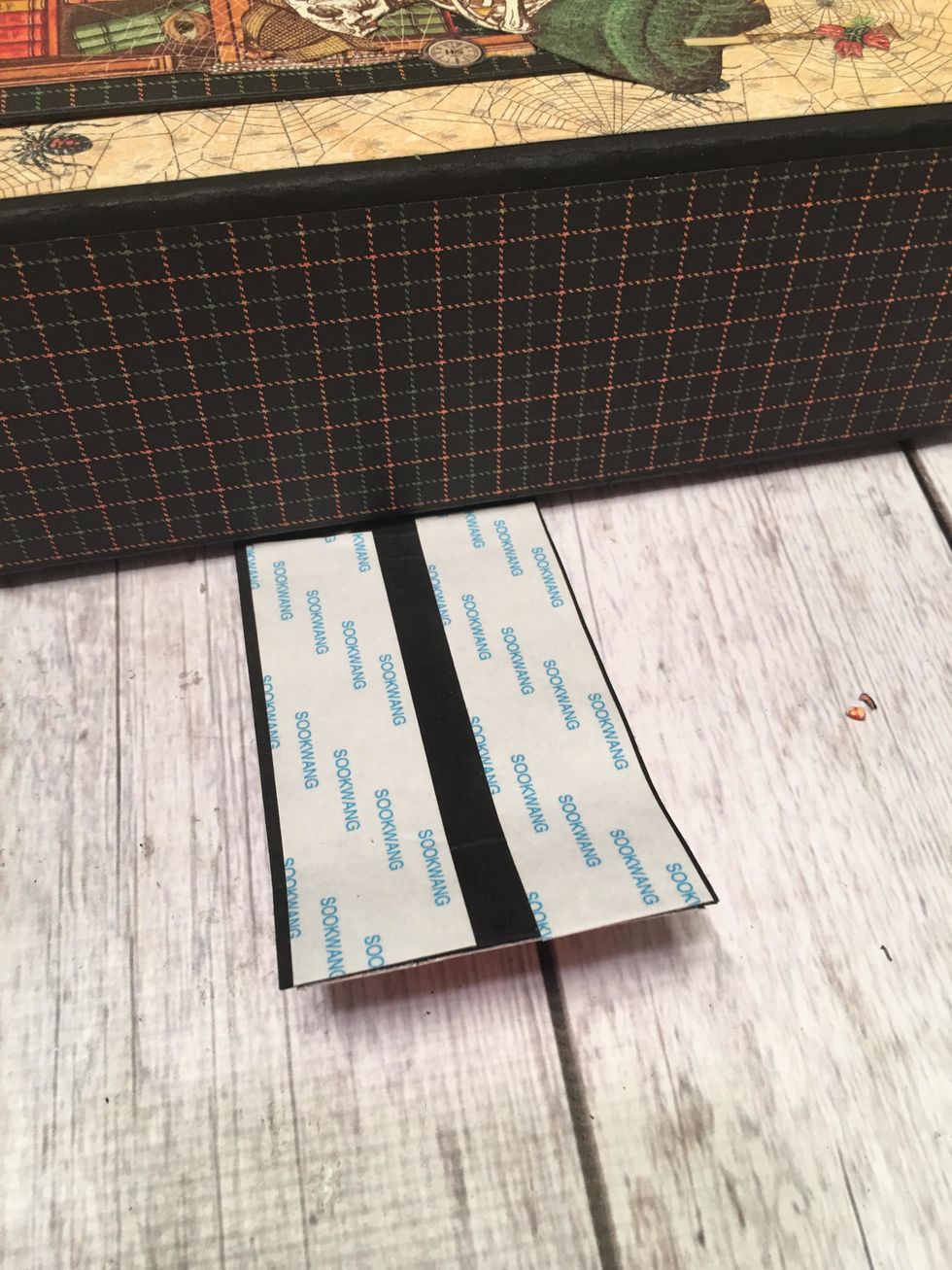 The piece of the closure that wraps around the left side of the album also needs scor-tape as shown.