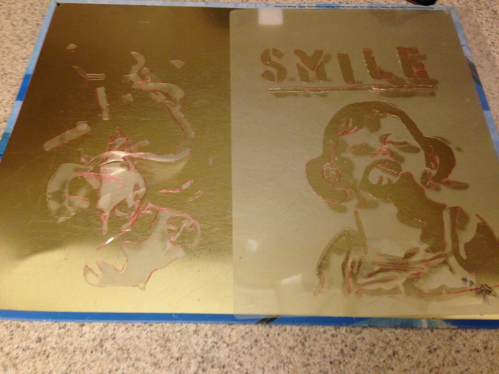 The pieces and the completely cut out stencil.