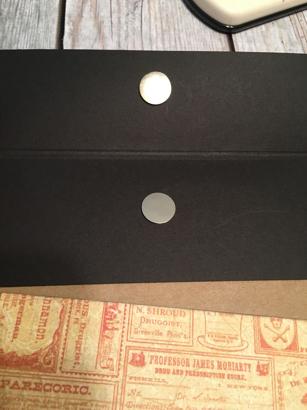 The placements of your two magnets should be approximately like this on the inside of the flap.