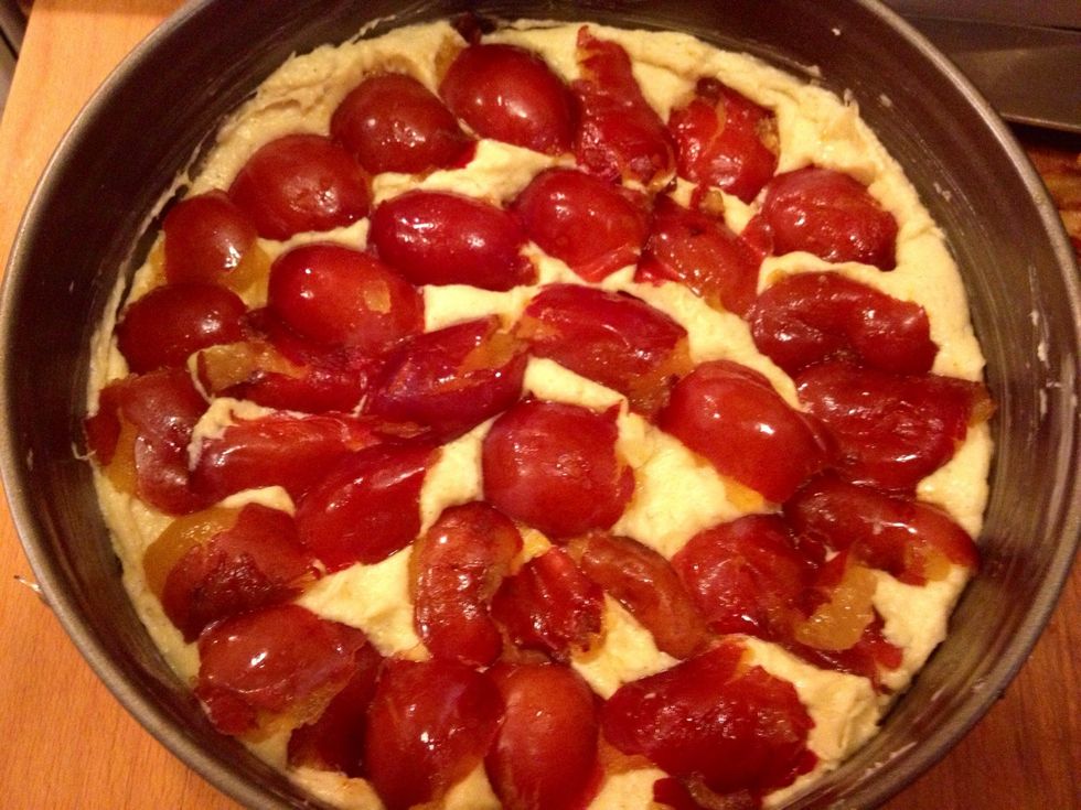 The plums were so ripe that I just "teared" them apart and put them on top of the batter. Less ripe plums need to be cut in half.