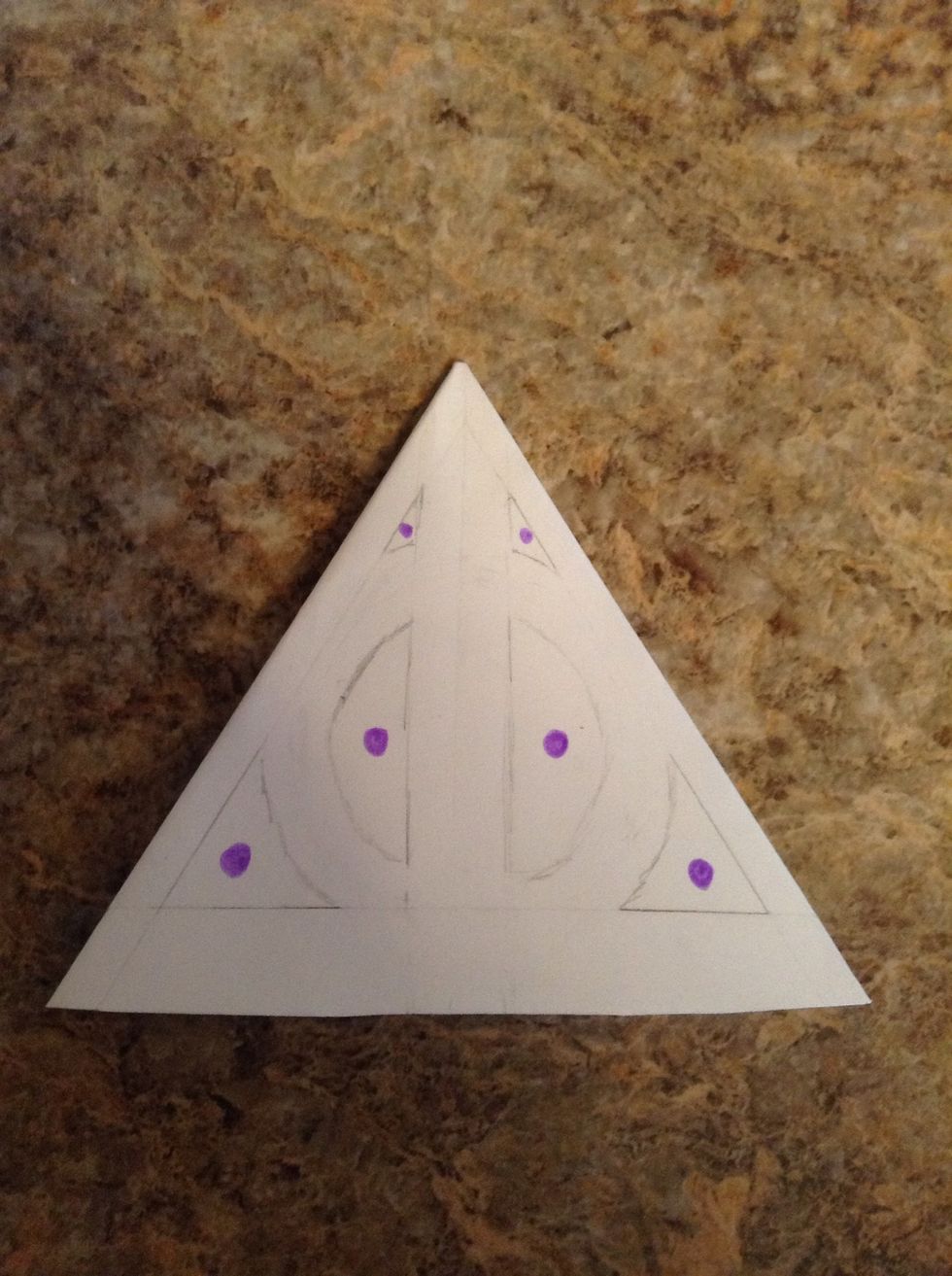 The purple dots mark the spaces we'll cut out. It is so much easier to use a craft knife for this.