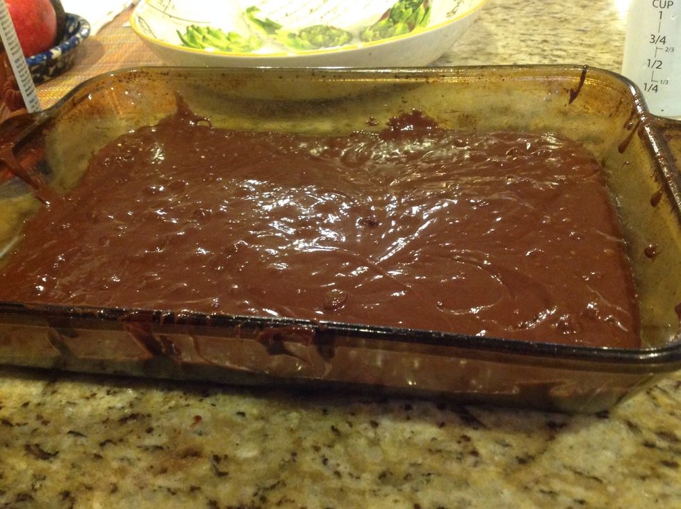 The put brownie mix into the pan