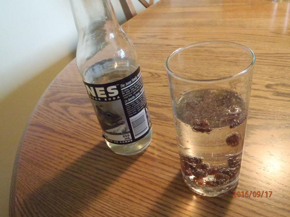 The raisins float up because the bubbles are lighter then the soft drink! But when they touch the top, the bubbles pop and the raisins fall back down!