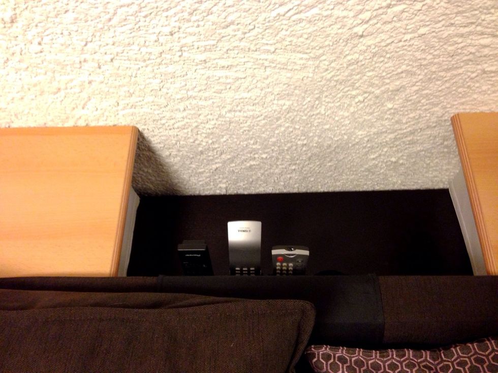 The remotes are held by something called 'FL\u00d6RT' - the stupid name indicates it can be found at any IKEA ;)