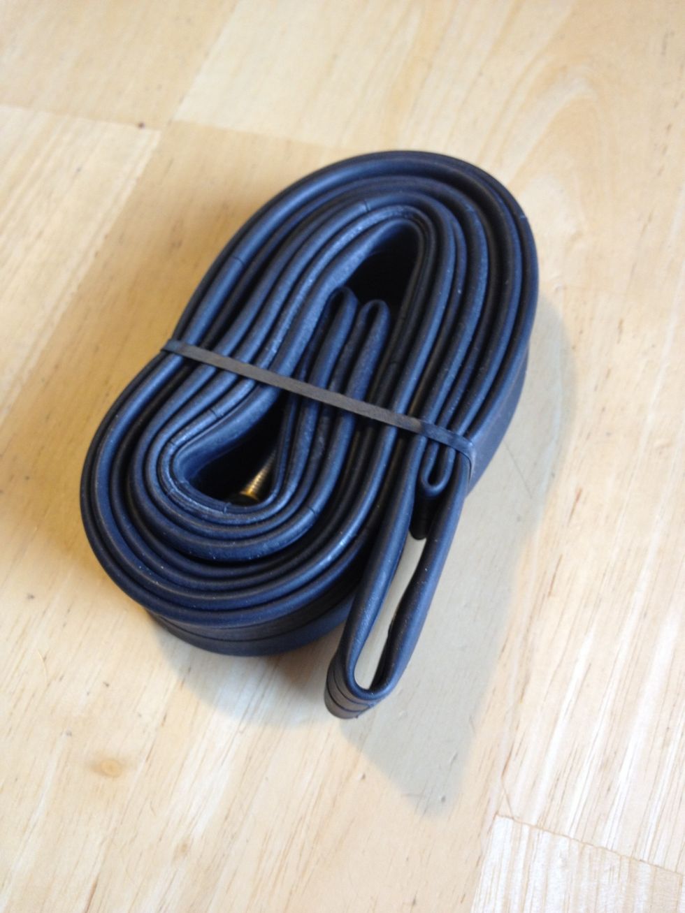 The rest of the kit serves to help you change a flat. Forget patch kits or "mini" tubes. Get a full size spare appropriate for your tires. No need to cut your ride short or change it again at home.