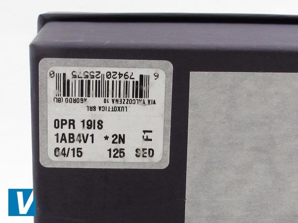 The retail box label details manufacturer information and a barcode. The model number should match the model number on the glasses themselves.